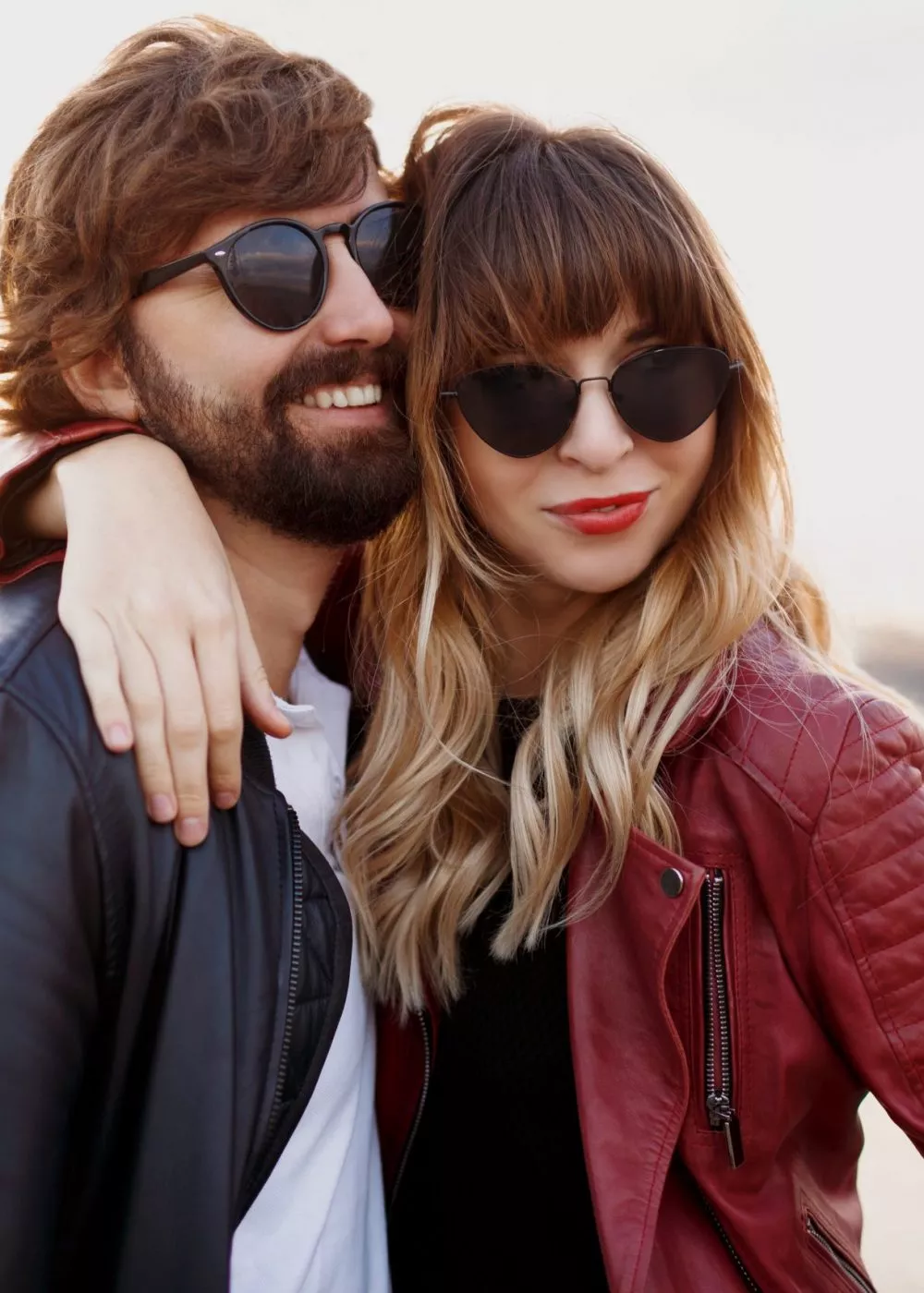 attractive-stylish-couple-love-posing-outdoor-hugging-walking-quay-soft-evening-colors-fashionable-look-trendy-sunglasses-man-woman-embarrassing Attractive stylish couple in love posing outdoor, hugging and walking on quay. Soft evening colors. Fashionable look. Trendy sunglasses. Man and woman embarrassing.