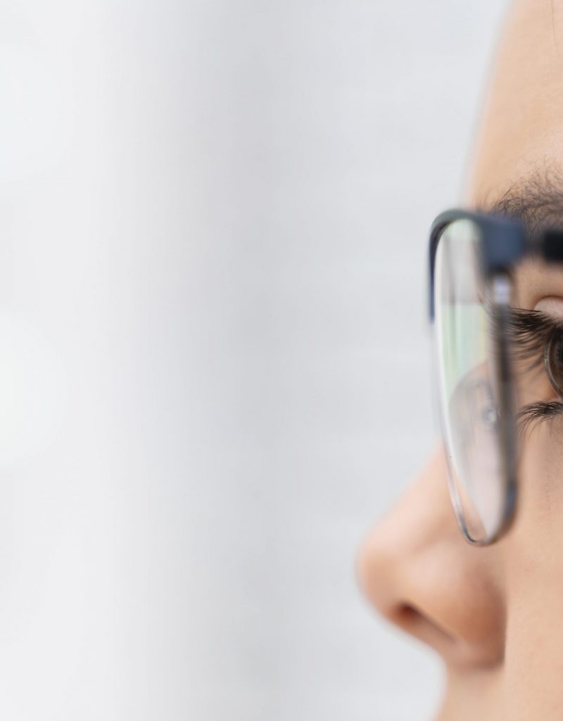 girl-store-trying-glasses-close-up girl-store-trying-glasses-close-up