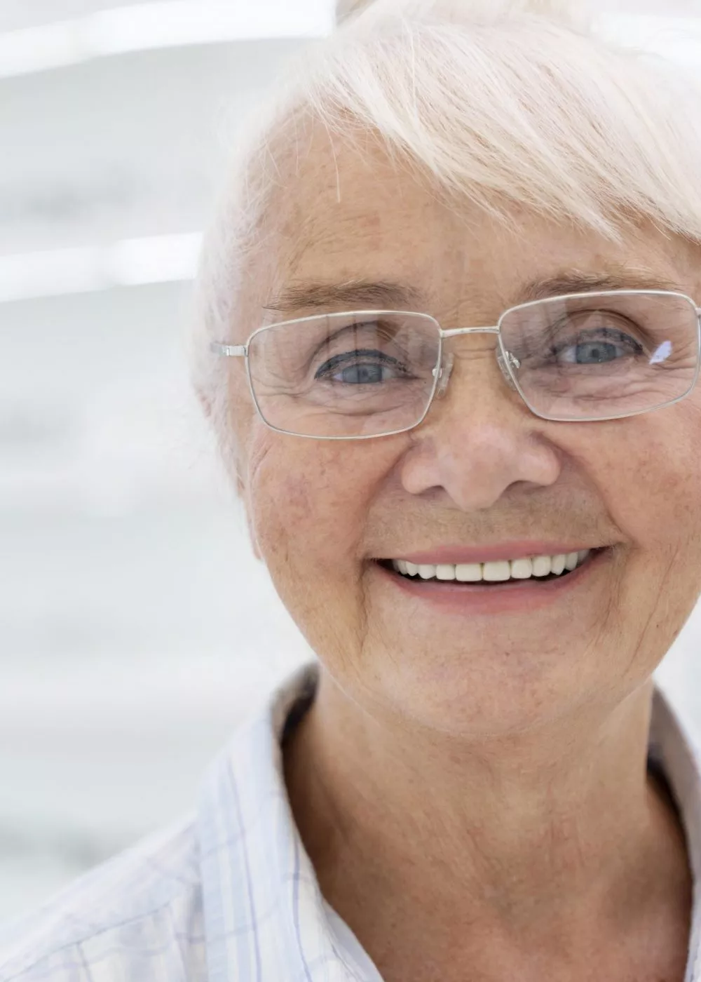 happy-older-woman-wearing-glasses happy-older-woman-wearing-glasses